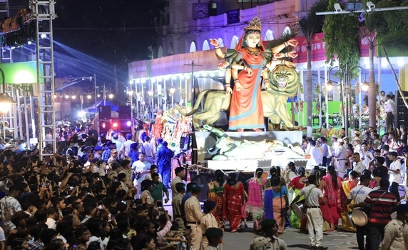 Glimpse of vibrant Mayer Gomon puja carnival in Agartala.